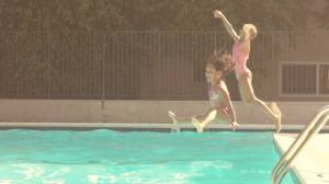 girls jumping in